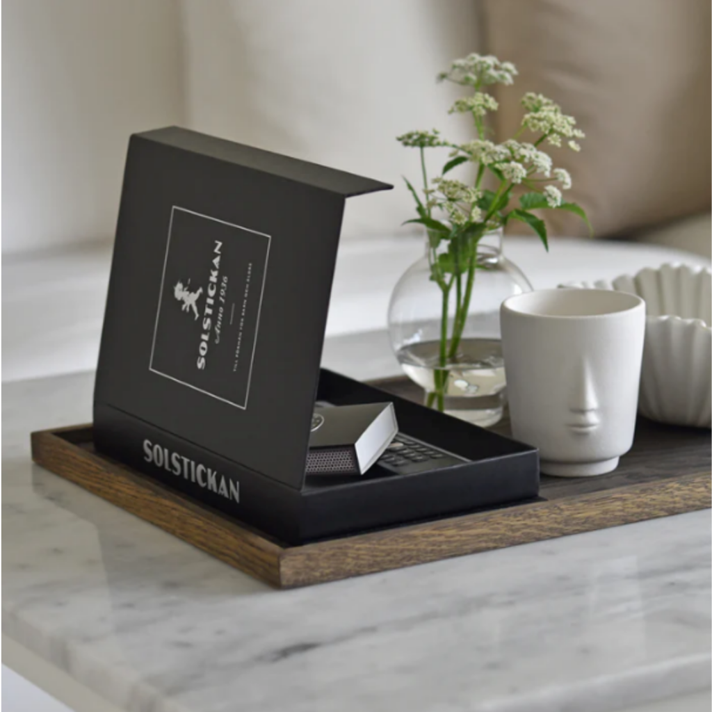 Solstickan brandfilt svart silver table book