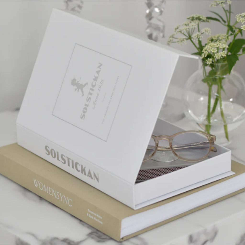 Solstickan brandfilt vit silver book case