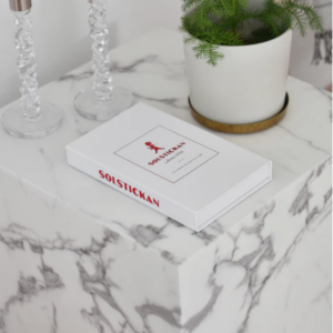 Solstickan brandfilt röd book case