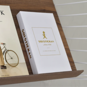 Solstickan brandfilt vit guld book case