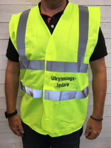utrymningsledare väst gul