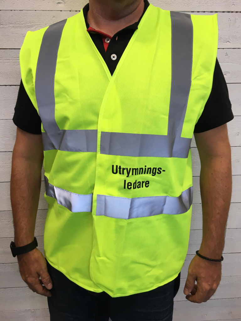 utrymningsledare väst gul